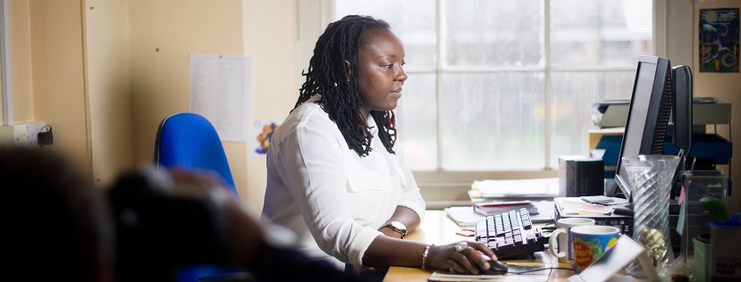 A lady using a computer