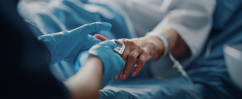 elderly person in hospital having blood test done