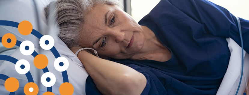 A woman in a hospital bed