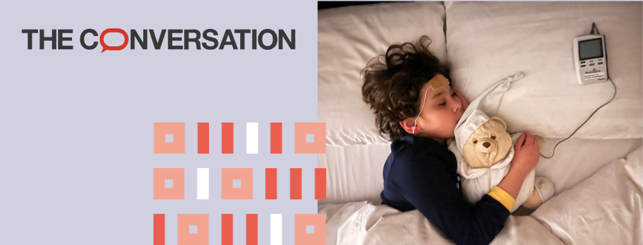 child sleeping with TNS device