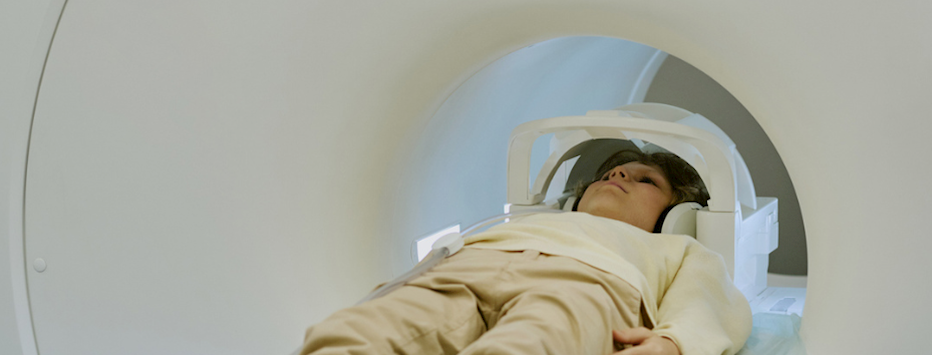 Child Lying Inside Mri Scanner Undergoing Medical Imaging Procedure