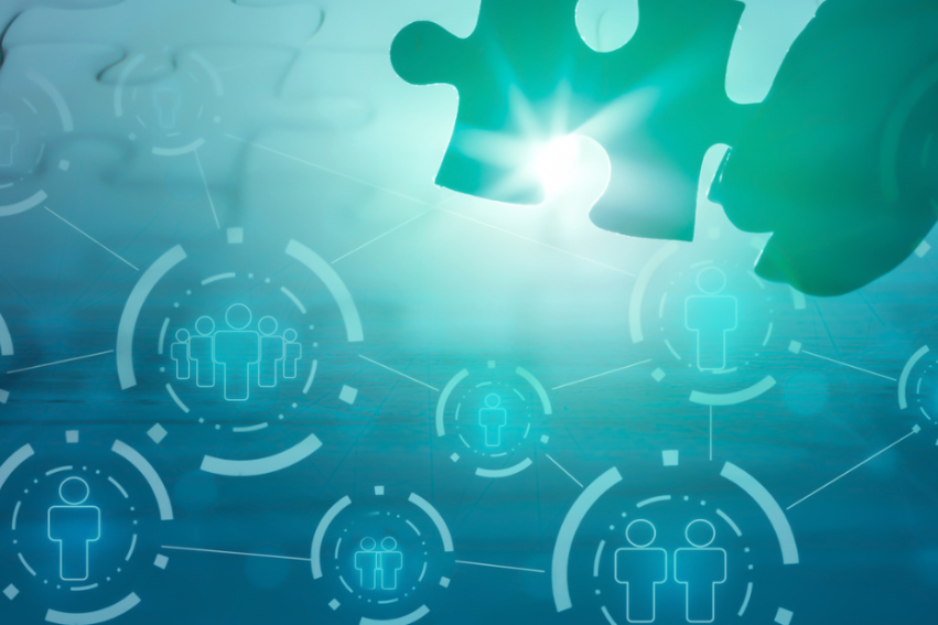 Puzzle piece and glowing connections against a blue backdrop, with network icons of people