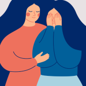 Illustration of two women with long blue hair; one in an orange sweater comforts the other in blue who covers her face, conveying empathy and support