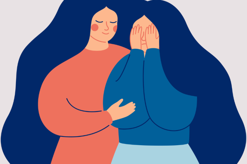 Illustration of two women with long blue hair; one in an orange sweater comforts the other in blue who covers her face, conveying empathy and support