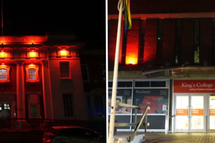 A building facade at night, dramatically illuminated in red light. Left: A classical structure with columns