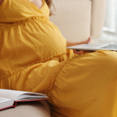 pregnant woman on laptop