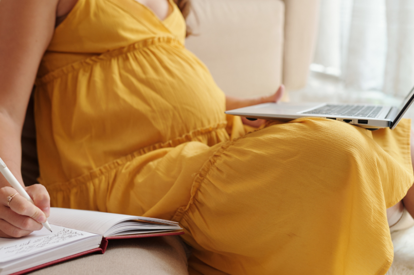 pregnant woman on laptop