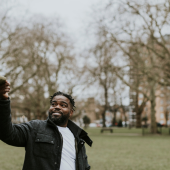 A parent and child in a park