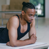 A young man using a laptop