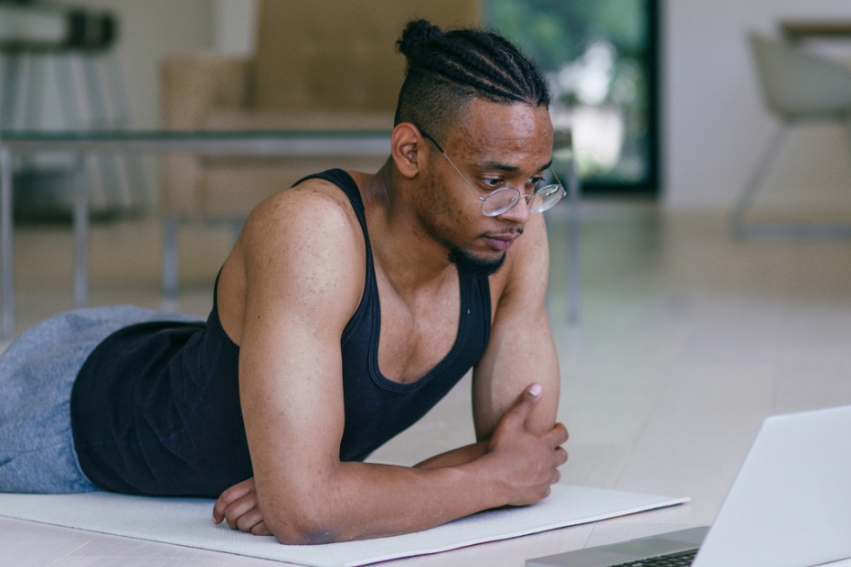 A young man using a laptop