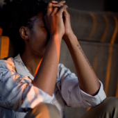 young girl upset in her room