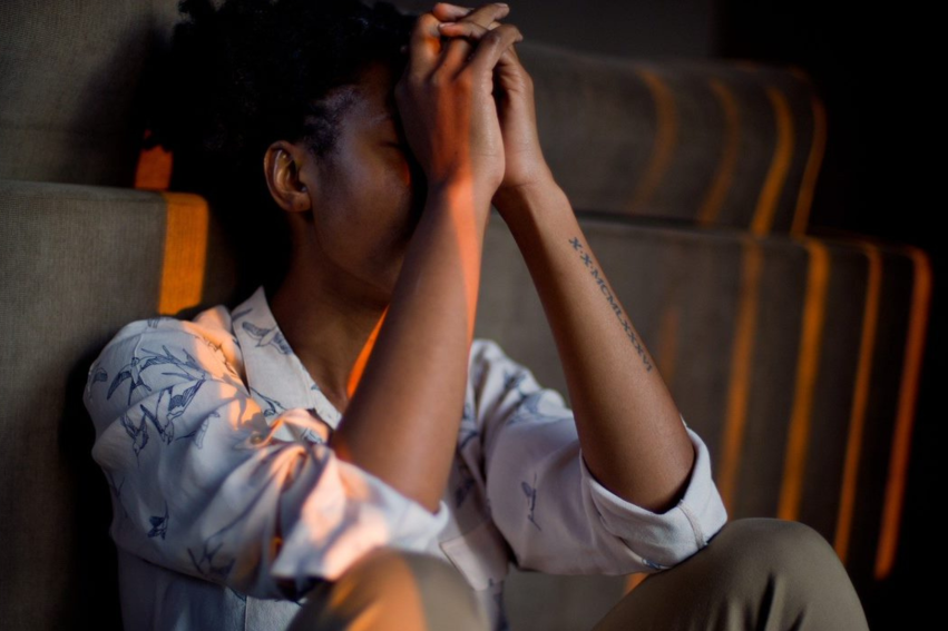 young girl upset in her room