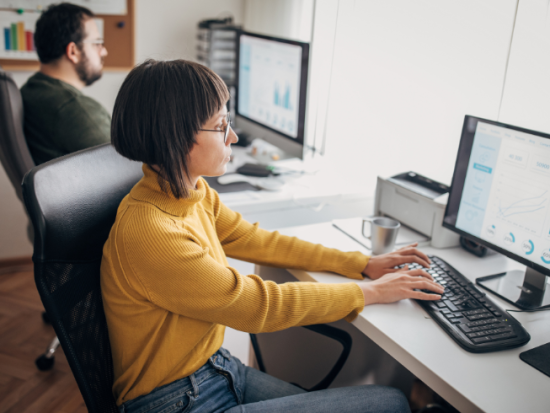 asian woman at laptop