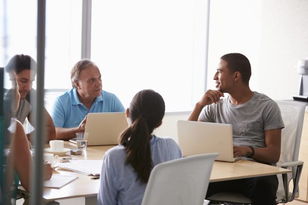 mixed group of people talking