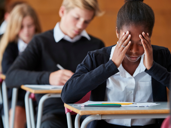 young girl upset at school