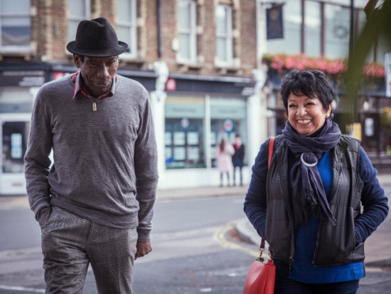 Two people walking together