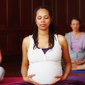 Pregnant women doing yoga
