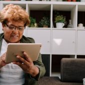 woman using ipad at home